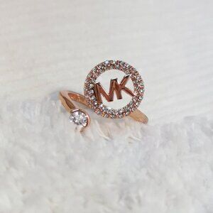 Michael Kors Monogram Logo and Crystal open ring size 7 in Rose Gold